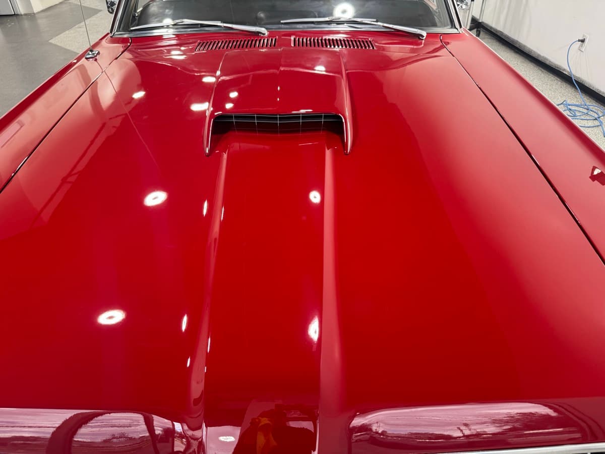 Ceramic coating application with hydrophobic water beading effect on vehicle paint
