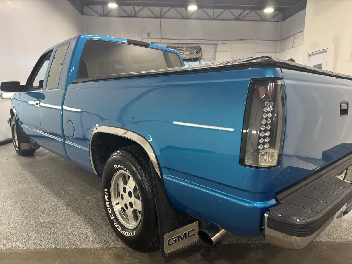Classic blue GMC truck with showroom-quality detail and mirror finish at 2Clean Inc. Calgary